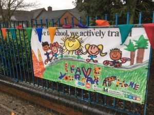 active travel banner outside school 